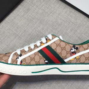 Replica Mens and Womens Gucci 606111 Disney x Gucci Tennis 1977 sneaker with Web in Beige GG Supreme