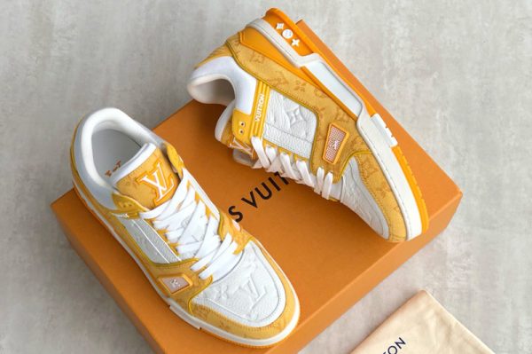 Replica Louis Vuitton 1A9JHB LV Trainer sneaker on Yellow Monogram denim and Monogram-embossed grained calf leather