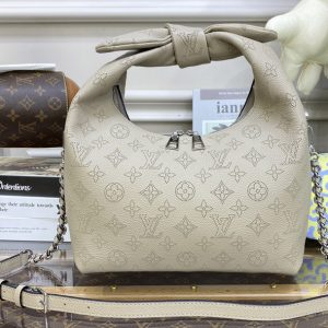 Louis Vuitton M20701 LV Why Knot PM handbag in Beige Mahina calf leather